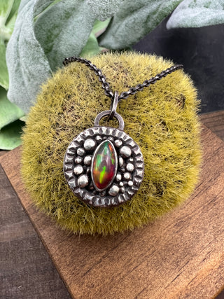 Unblinking Pendant