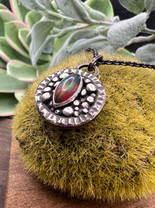 Unblinking Pendant