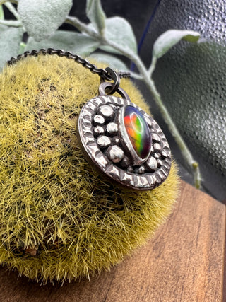 Unblinking Pendant