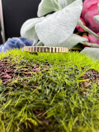 Vertical Ribbed Gold Band