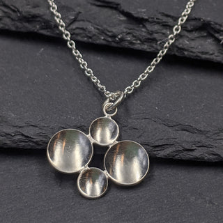 Four Parabolic Disc Necklace